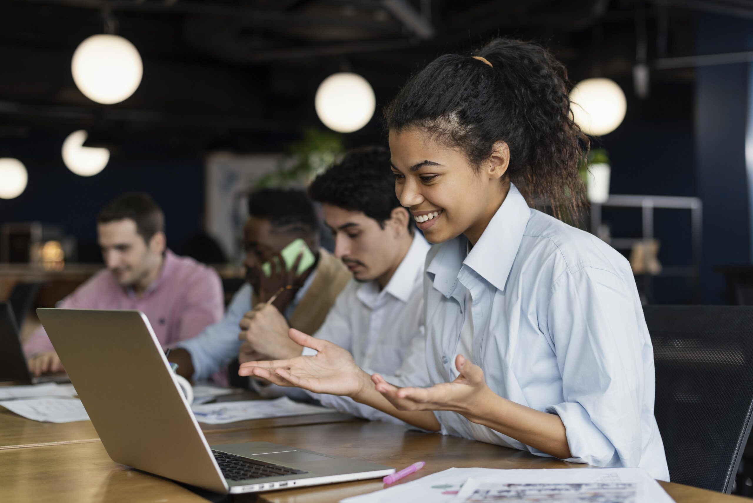 smiley-woman-having-video-call-office